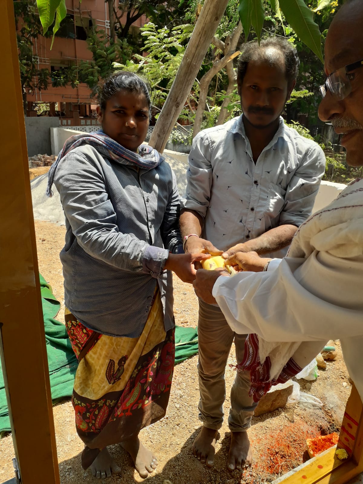  Errection of main door on 2024-04-26 at 9. 45 AM in the building of Senior Citizen Association site,HTC 